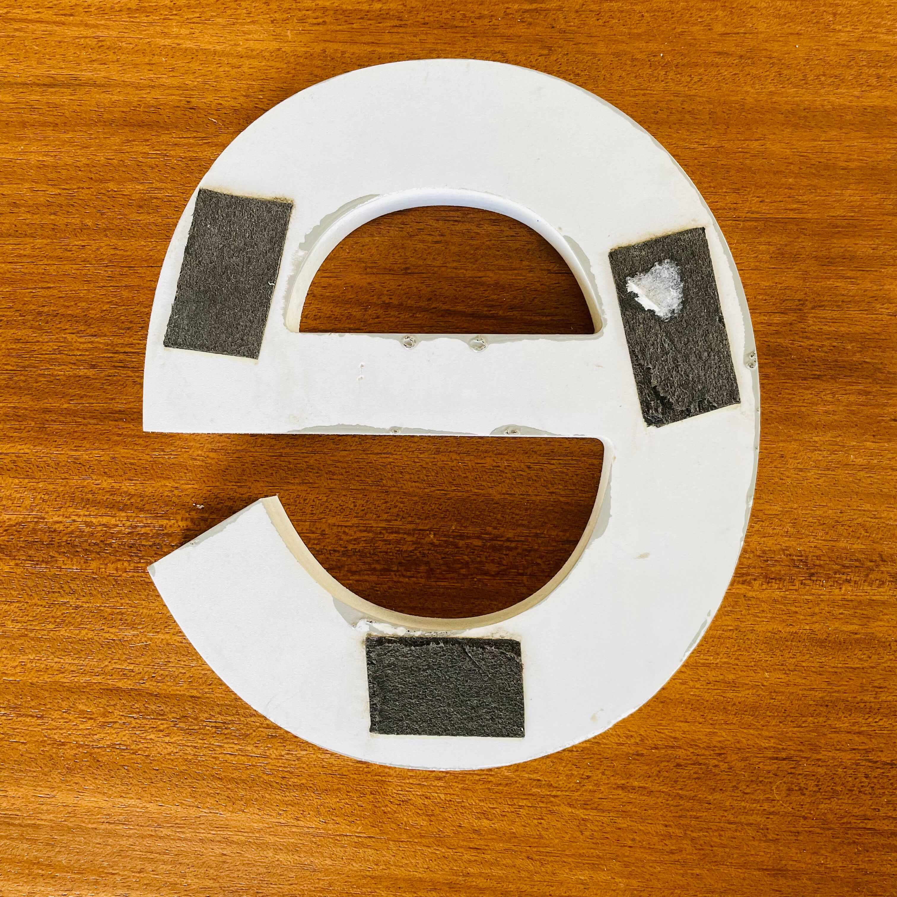 Wooden sign letter "e"