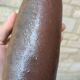 Old handmade terracotta bottle