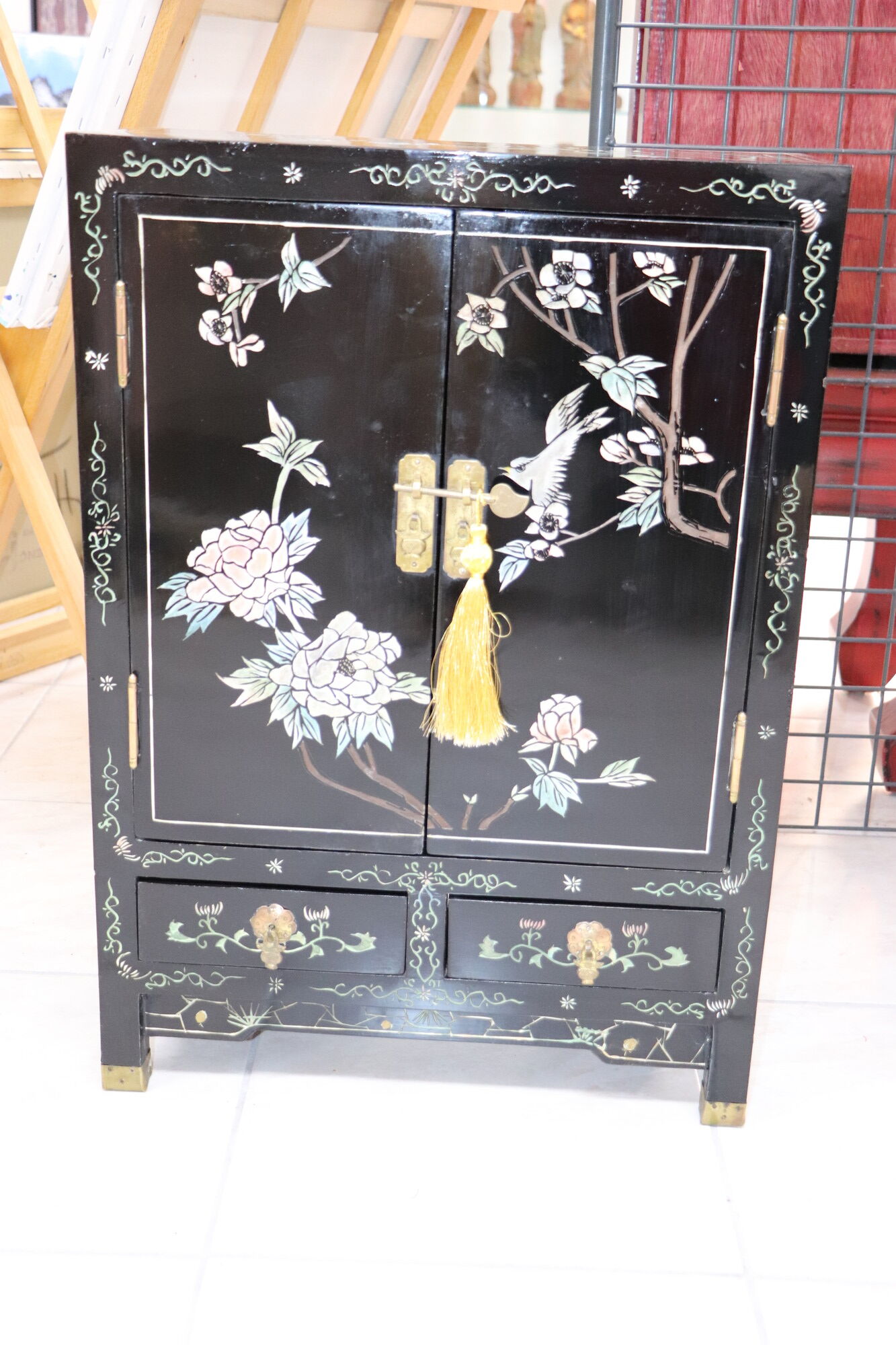 Small storage cabinet or bedside table lacquered black incised and painted
