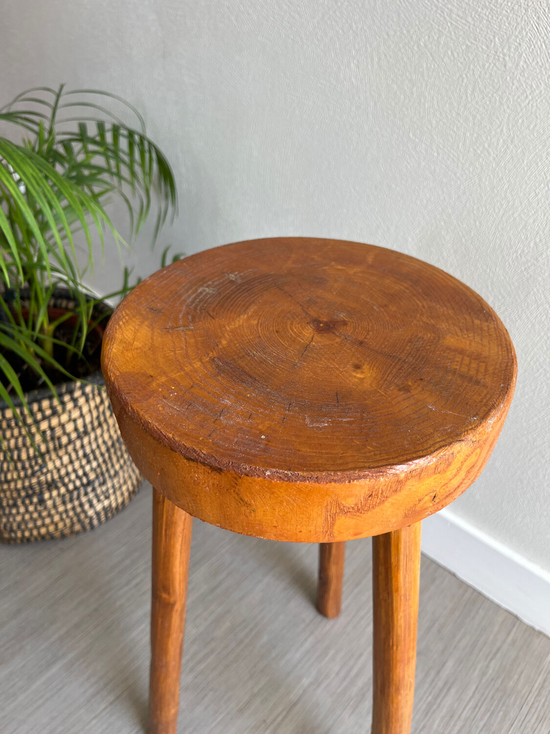 Tripod stool in a brutalist style