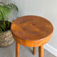 Tripod stool in a brutalist style