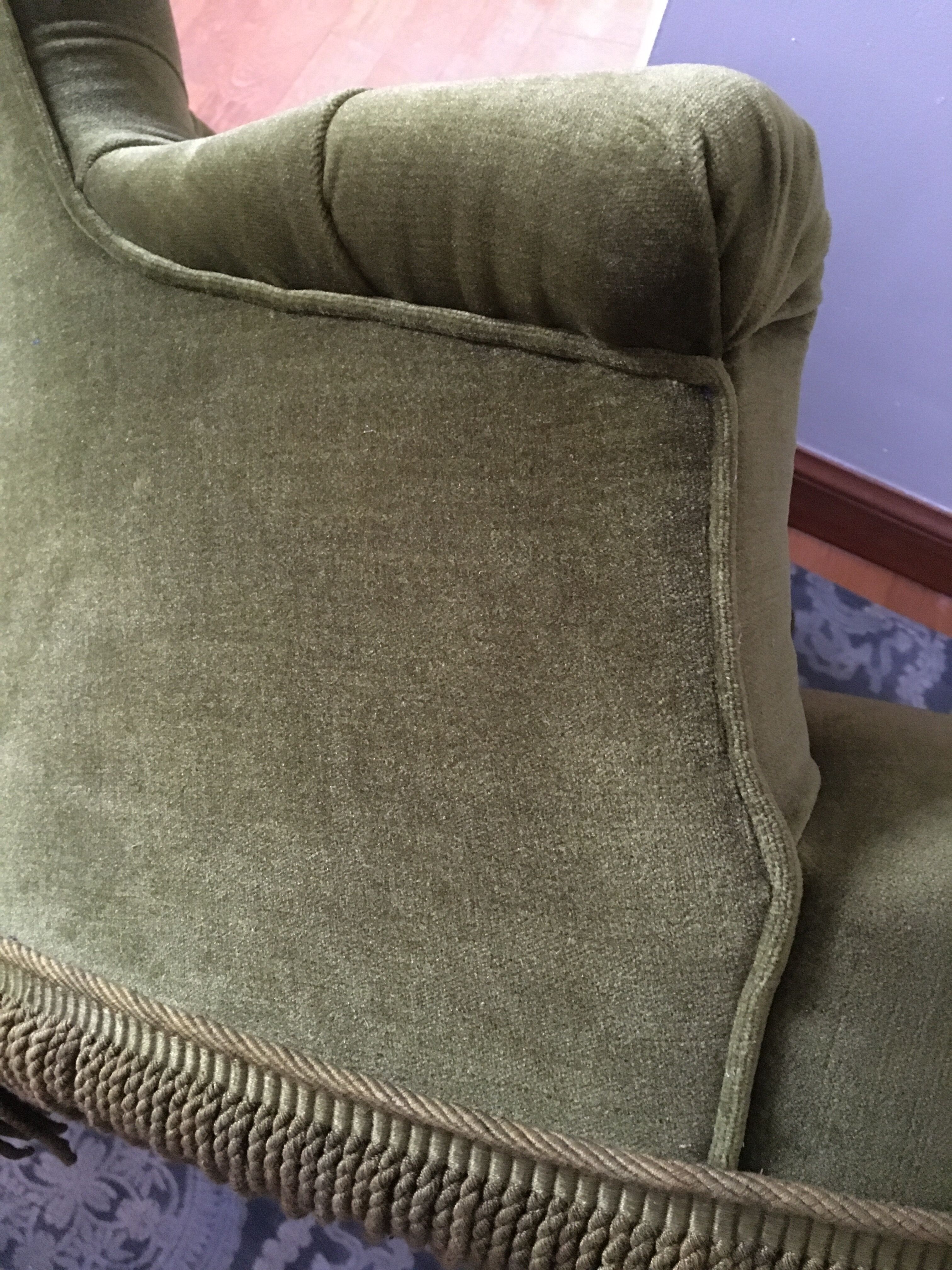 Old chair padded green velvet