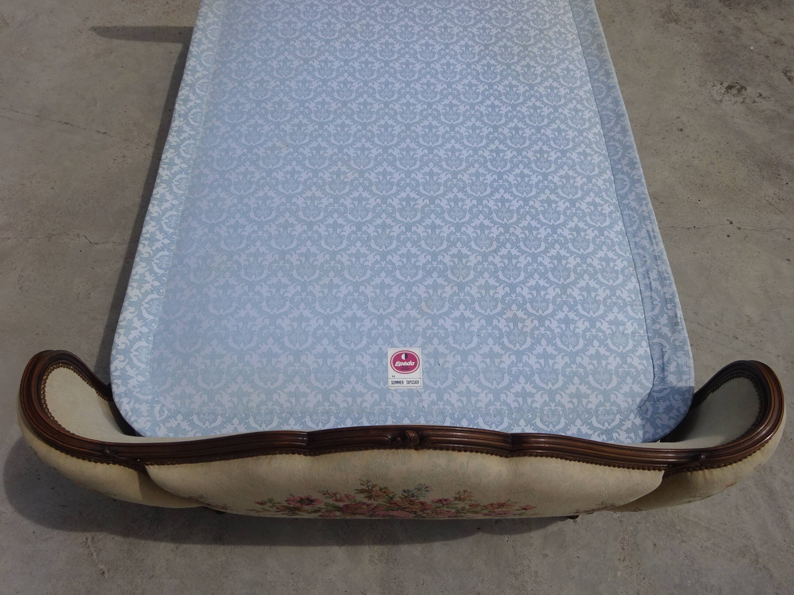 Solid wood bed frame with Jacquard fabric.