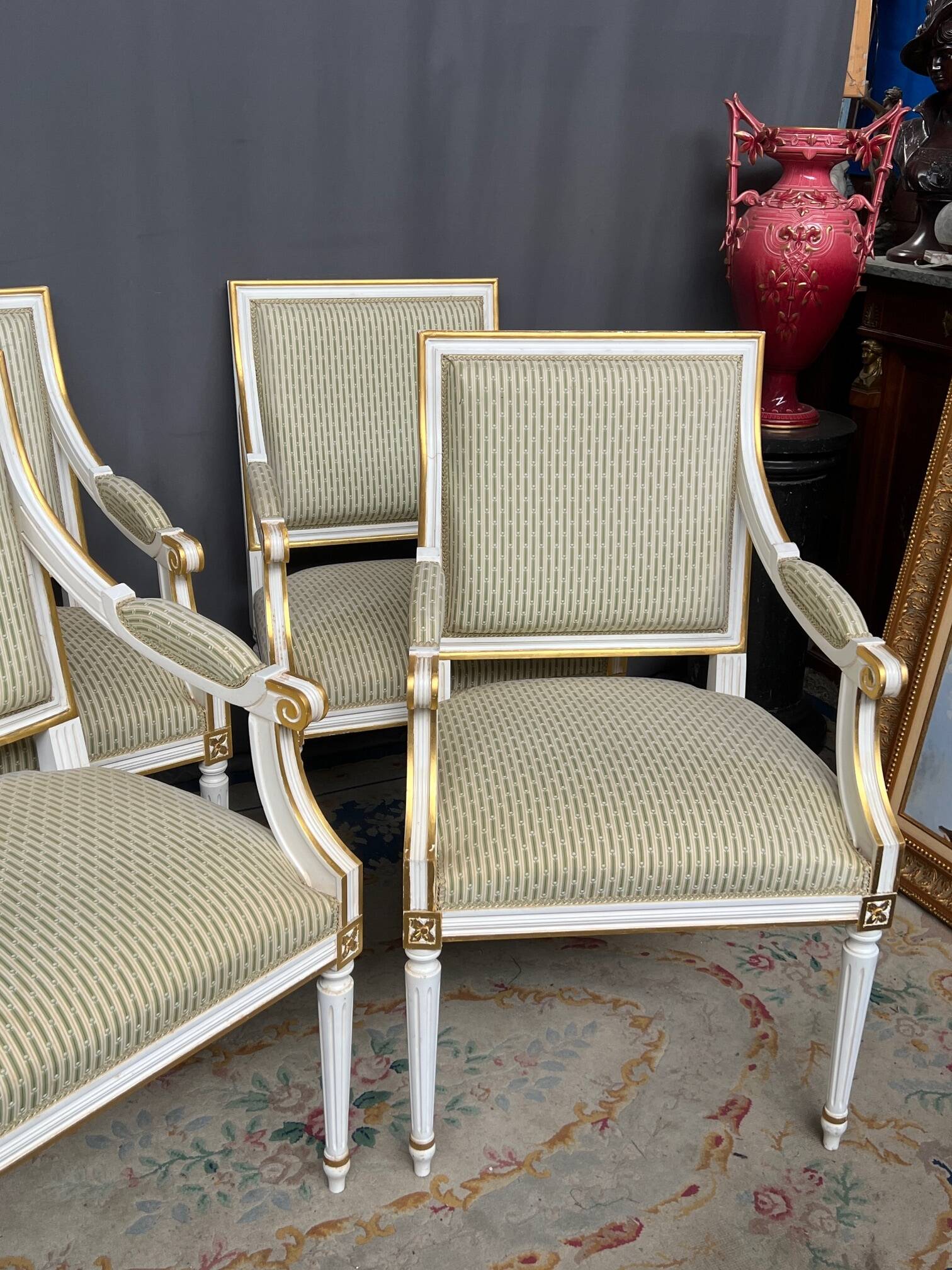 Set of four classic Louis XVI armchairs. Solid wood.