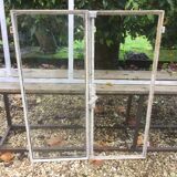 Old glass roof with door and window