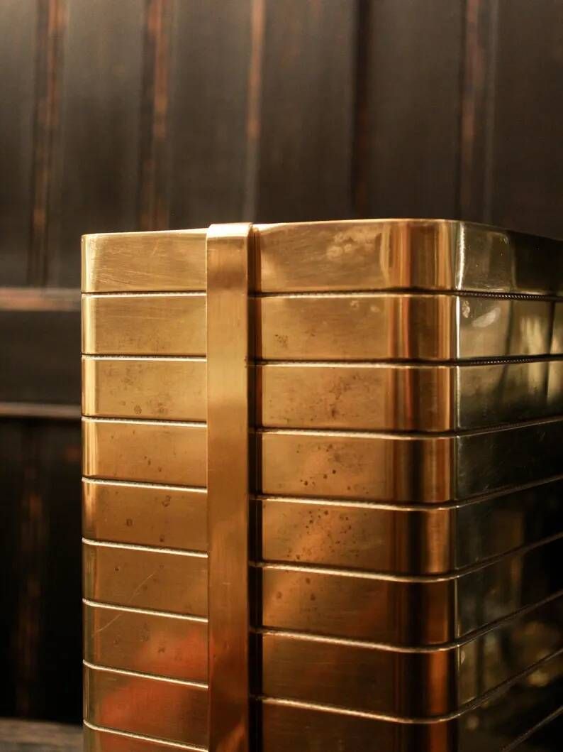 Italian gold-plated bottle cooler, architectural ribbed design.