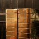 Italian gold-plated bottle cooler, architectural ribbed design.