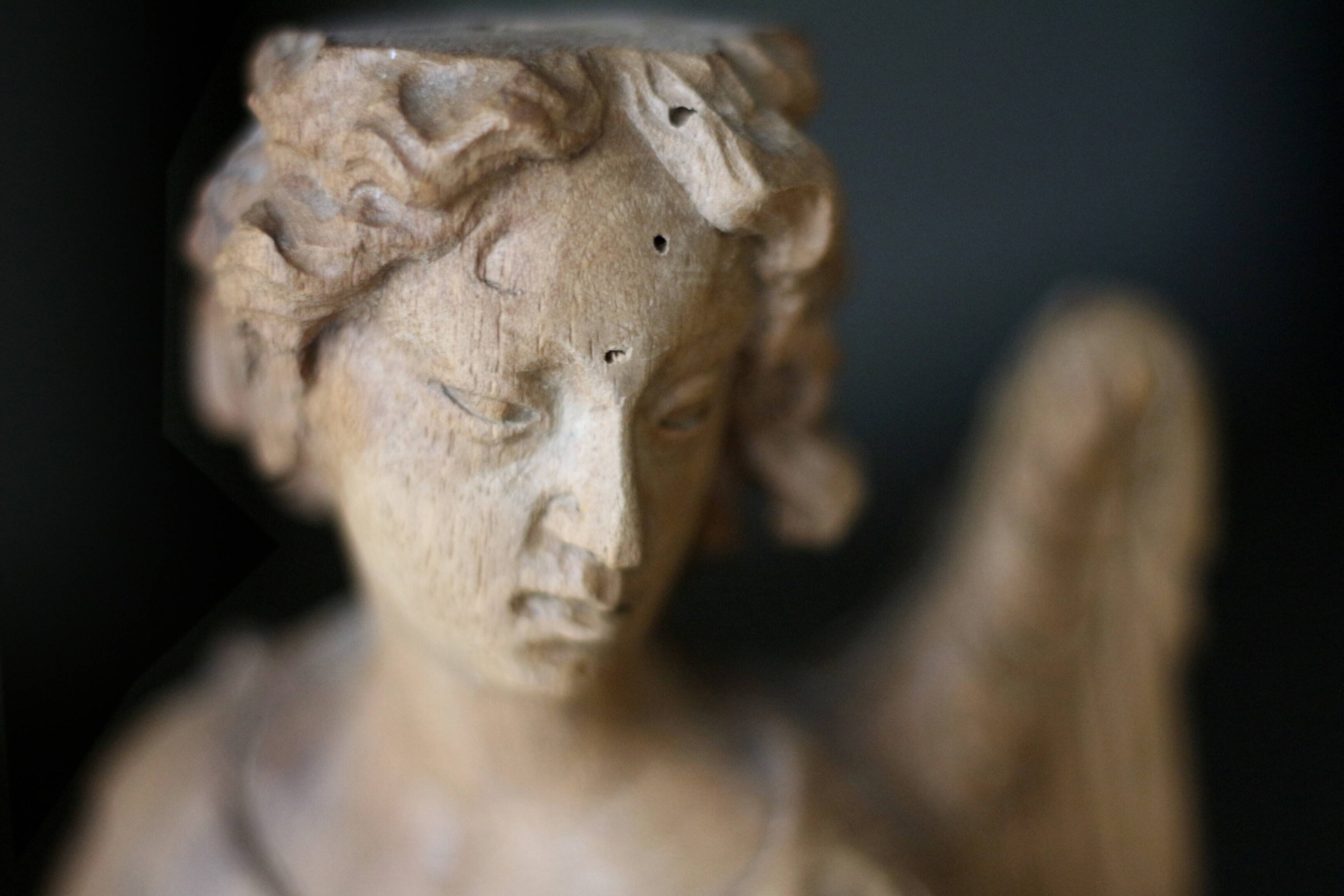 Sacred art: 19th century beechwood cherub statuette