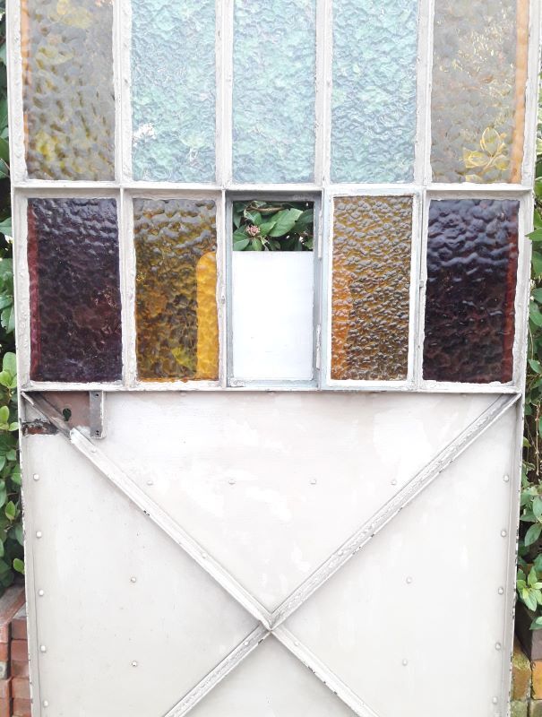 Workshop door 258.4x98.5cm in iron and colored cathedral glass