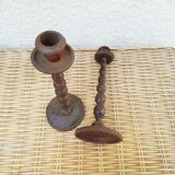 2 cast iron candlesticks