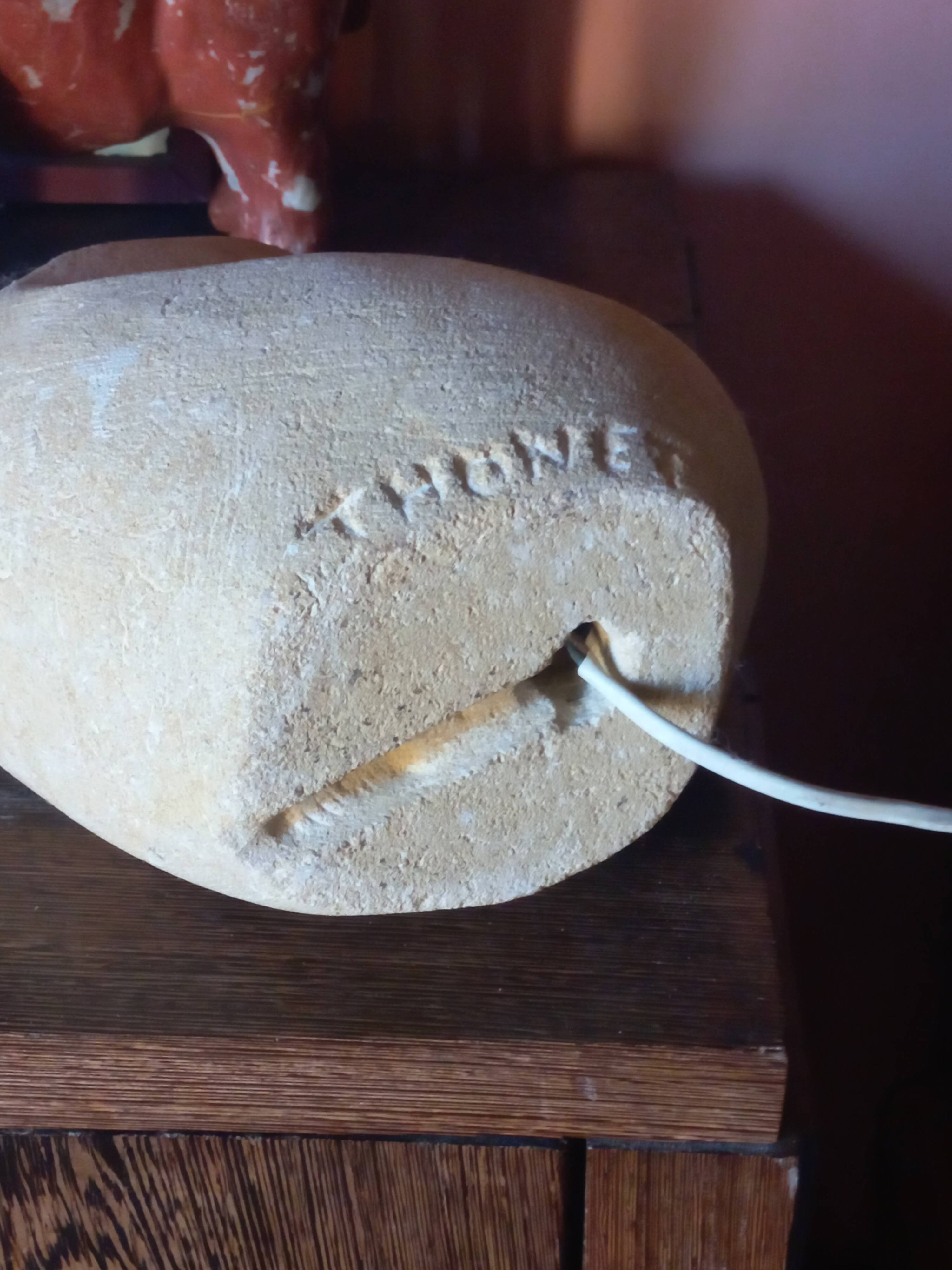 Sculpted stone lamp from the 1970s, signed.
