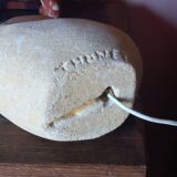 Sculpted stone lamp from the 1970s, signed.