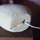 Sculpted stone lamp from the 1970s, signed.