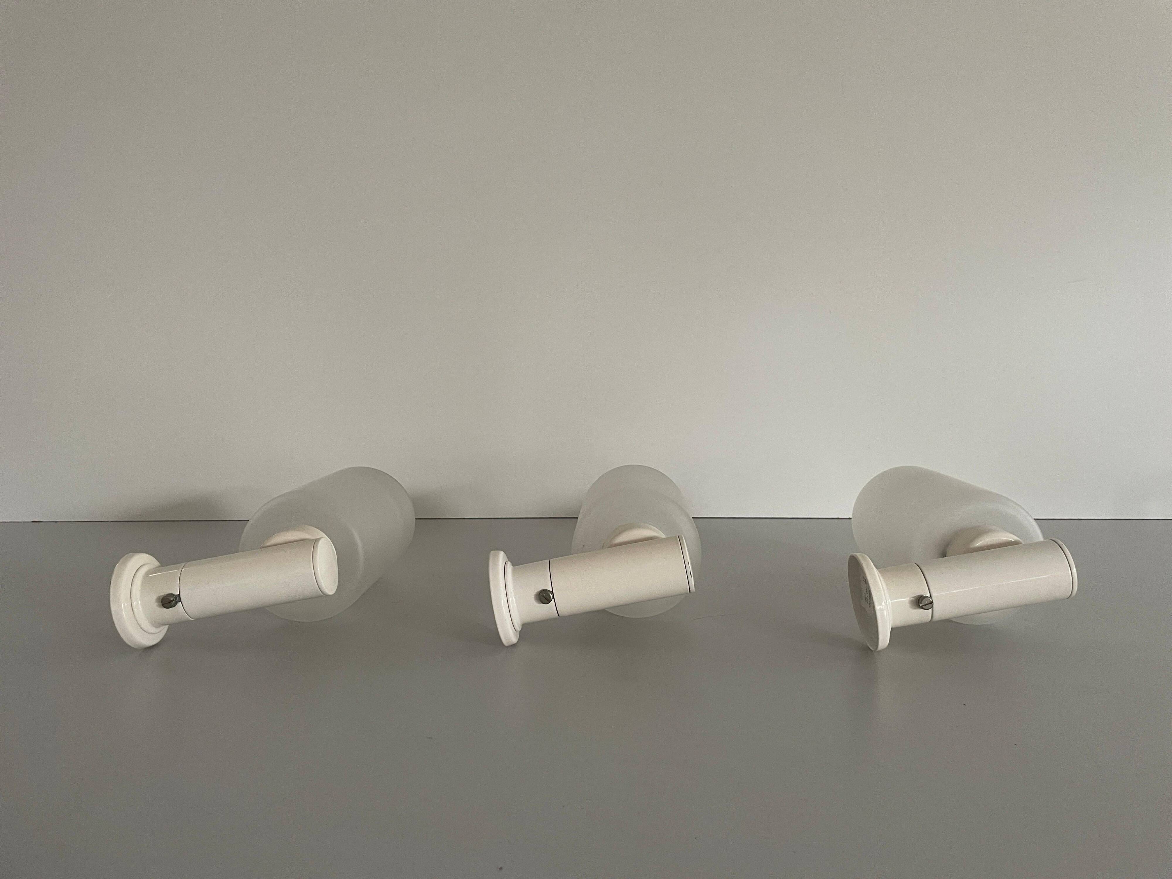 Set of 3 semi-transparent glass and white metal wall lights, 1960, Germany