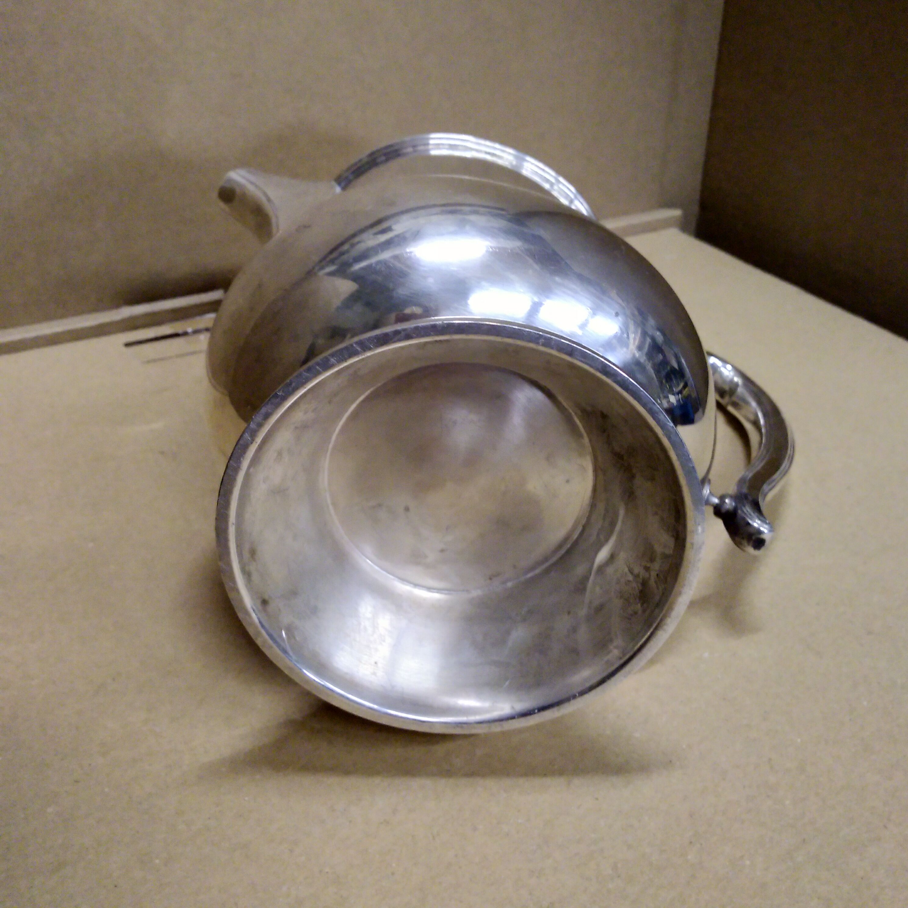 Italian hotel teapot made of silver metal