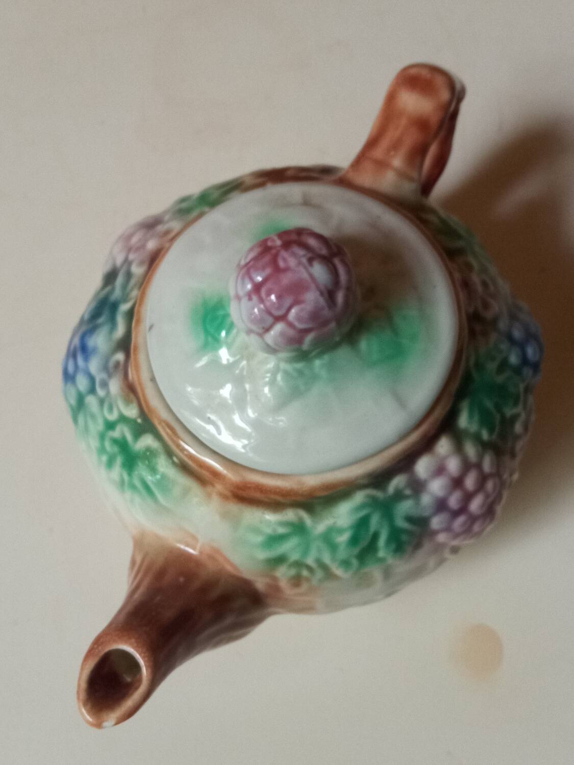 Antique teapot in slip