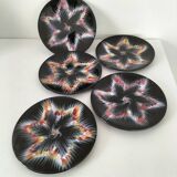 5 plates with stylized star pattern