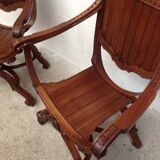 Paire de fauteuils anciens curules dit Dagobert en bois sculpté