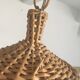 Suspension in wicker and amber glass