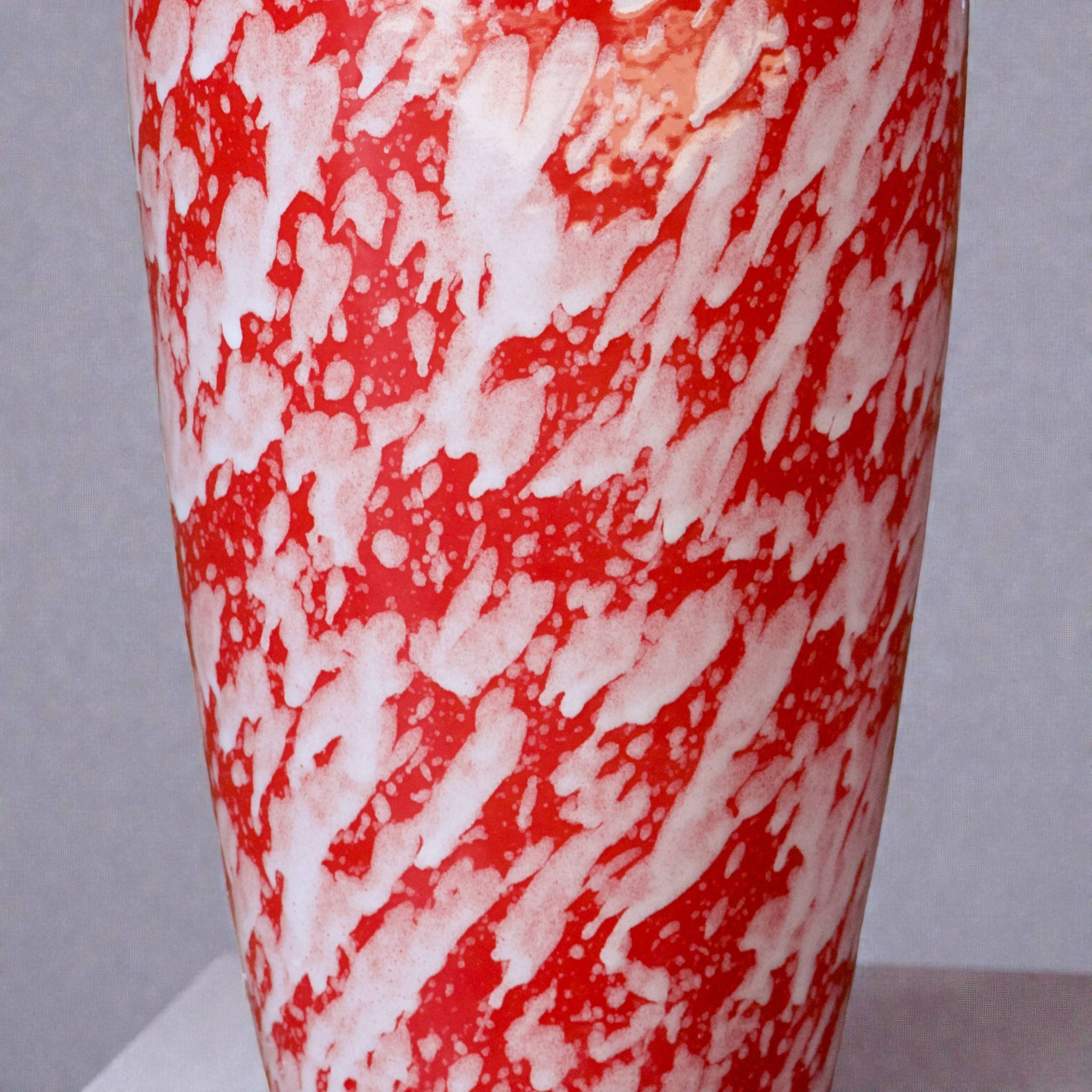 Large handcrafted vase in red speckled glazed ceramic.