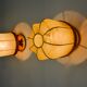 Pair of "cocoon" wall lights, resin and pine, Italy, 1970