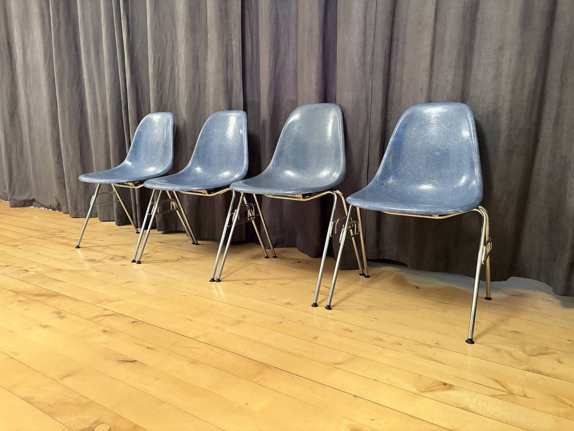 Set of four DSS chairs, fiberglass, designed by Charles and Ray Eames, Herm