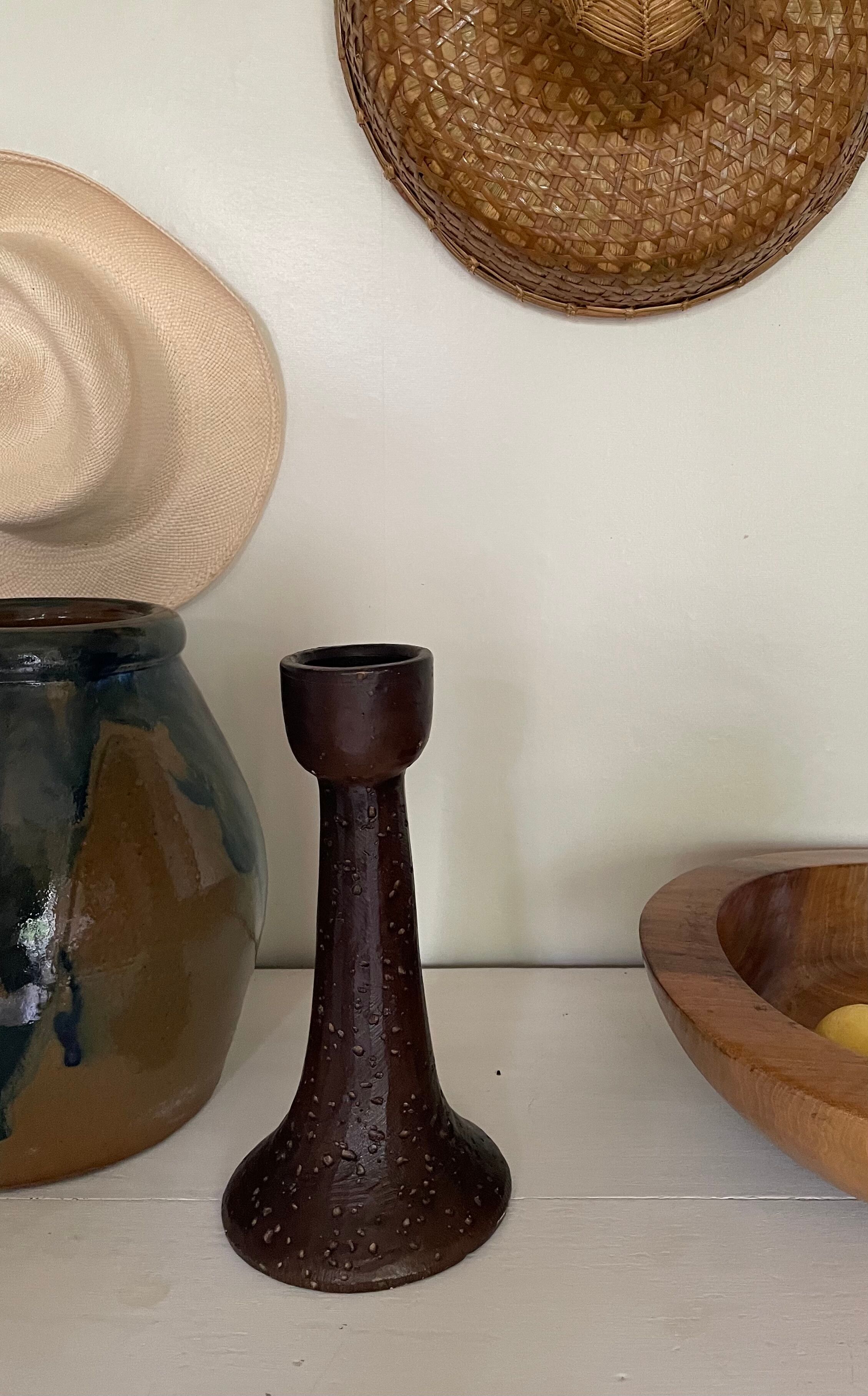 Brown enamelled terracotta candle holder