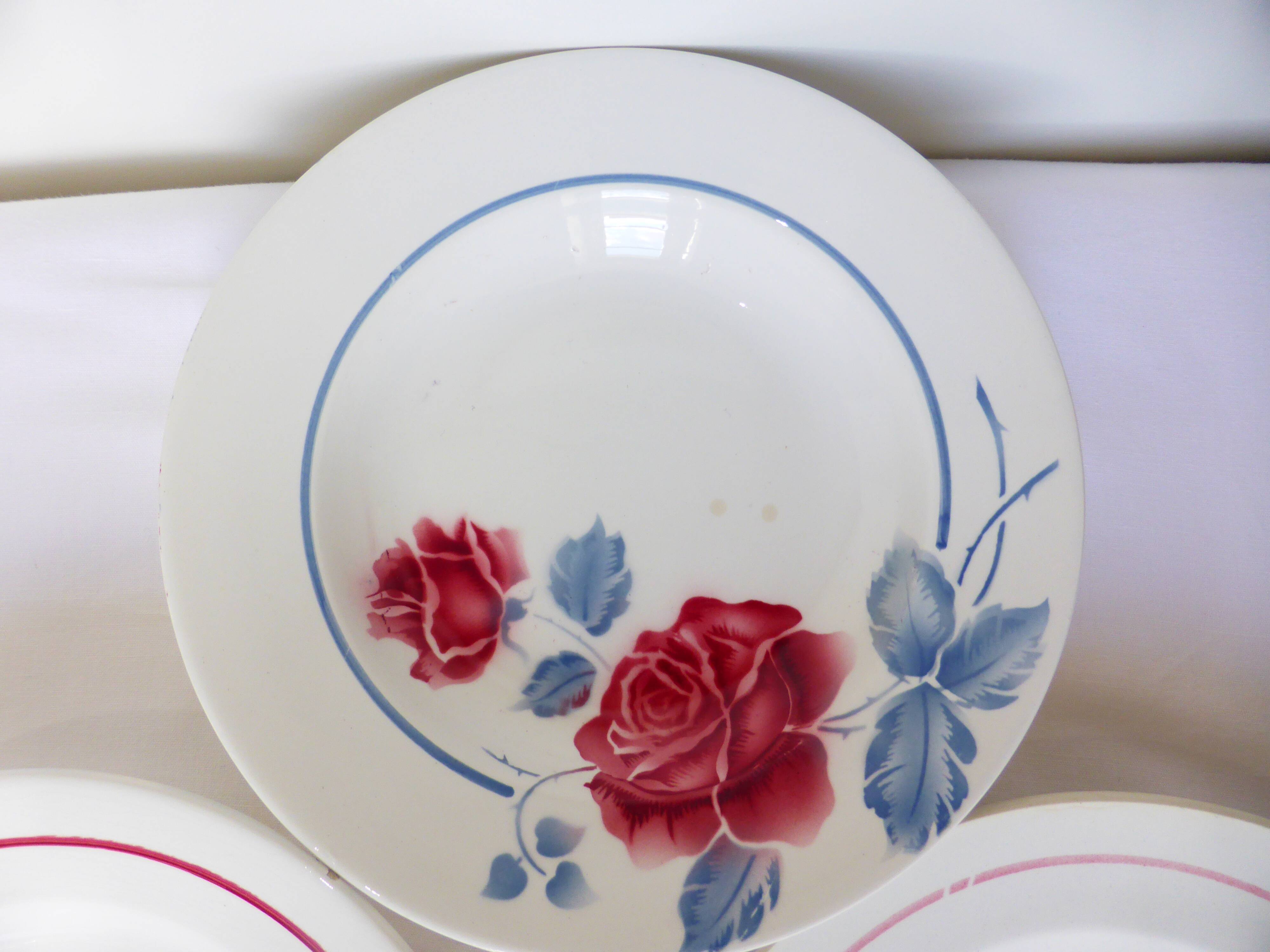 3 vintage soup plates in a jumble