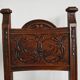 Pair of Neo-Renaissance oak chairs with straw seats, 1910