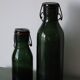 Pair of old green glass jars/bottles – models 1/2 and 1 1/