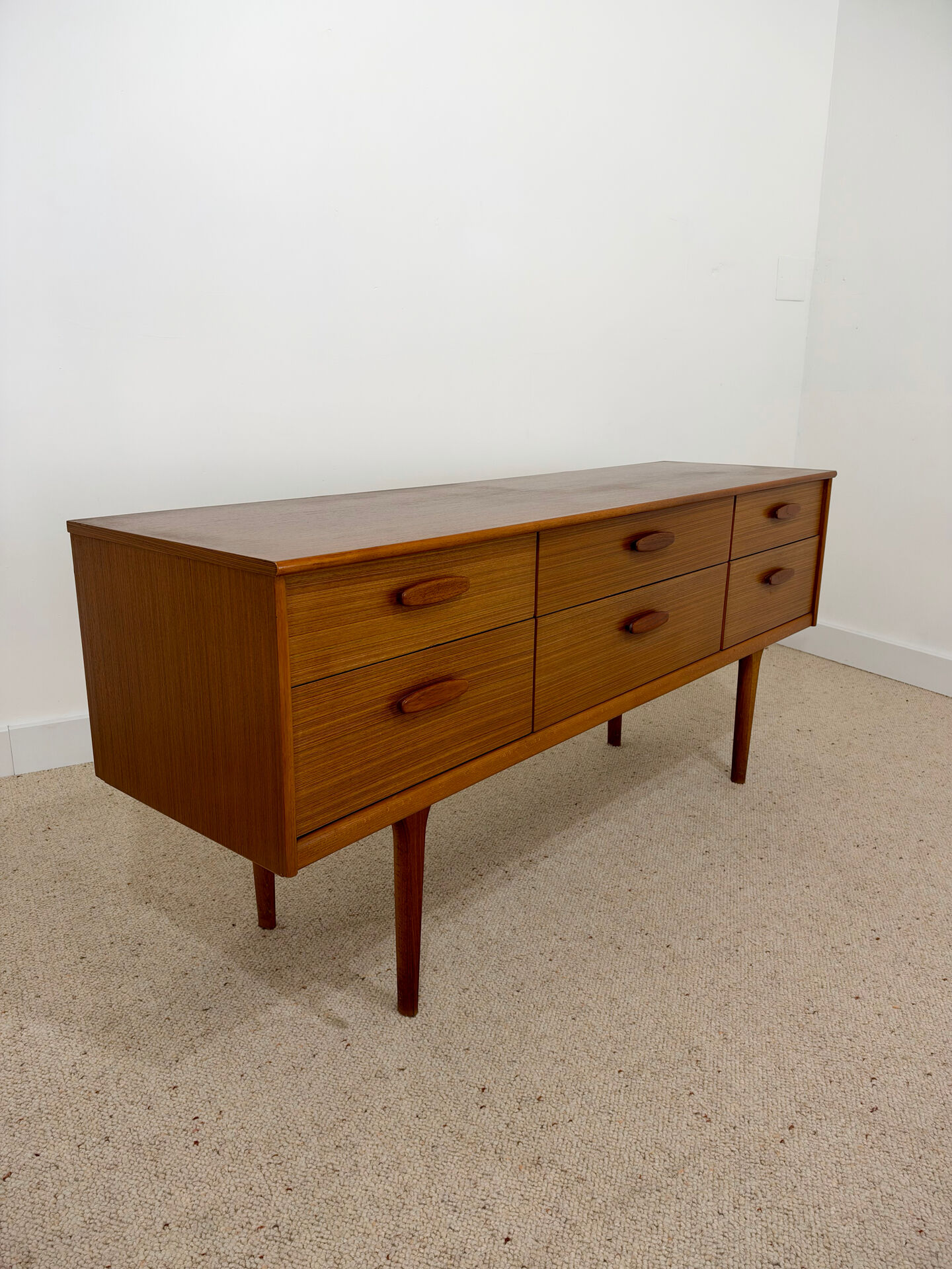 Low enfilade Austin Suite in teak – 1960s