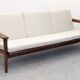 Scandinavian style three-seater sofa in teak, France circa 1950.