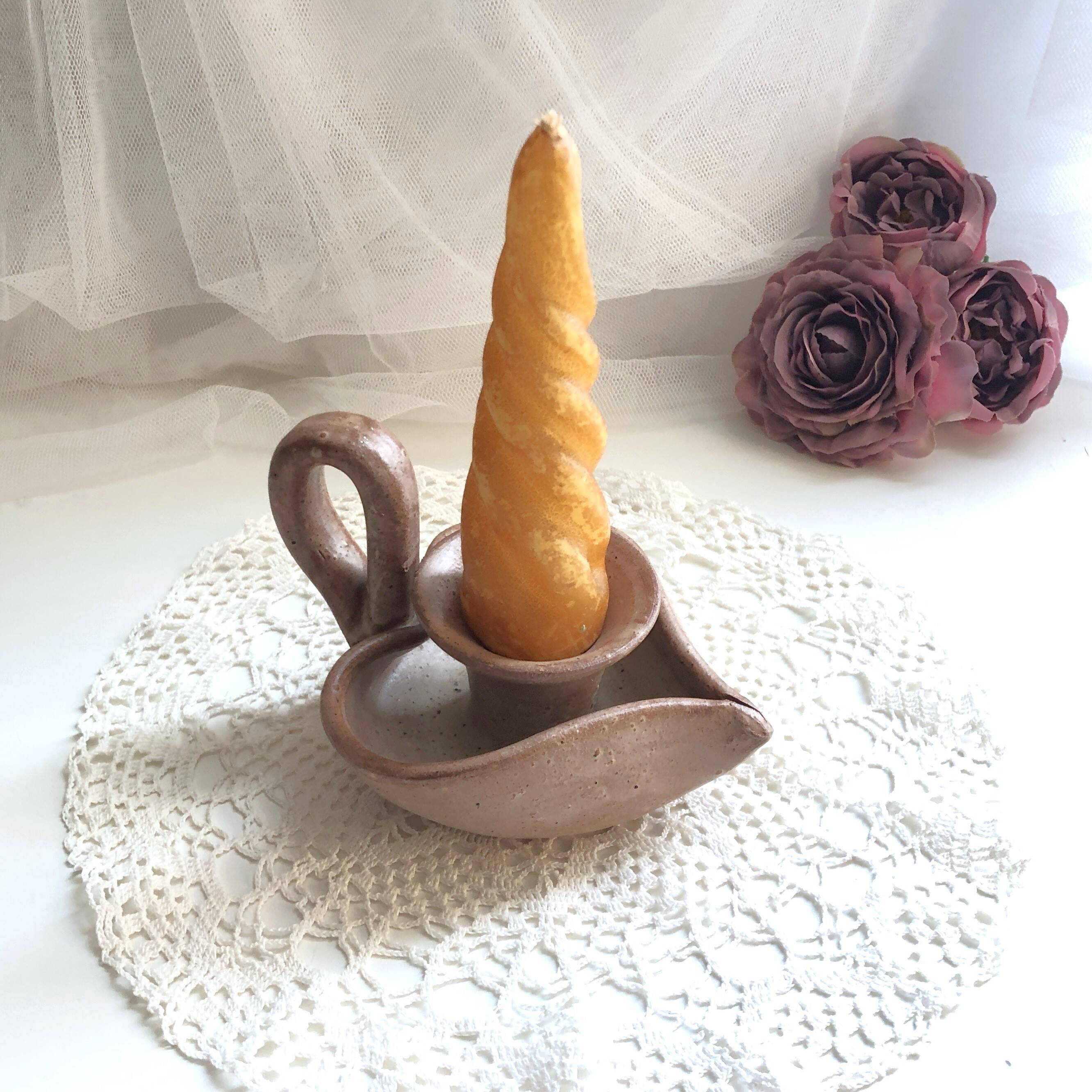 Glazed stoneware heart-shaped hand candle holder