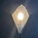 Pair of Art Deco wall sconces in molded glass and gilt brass, 1930