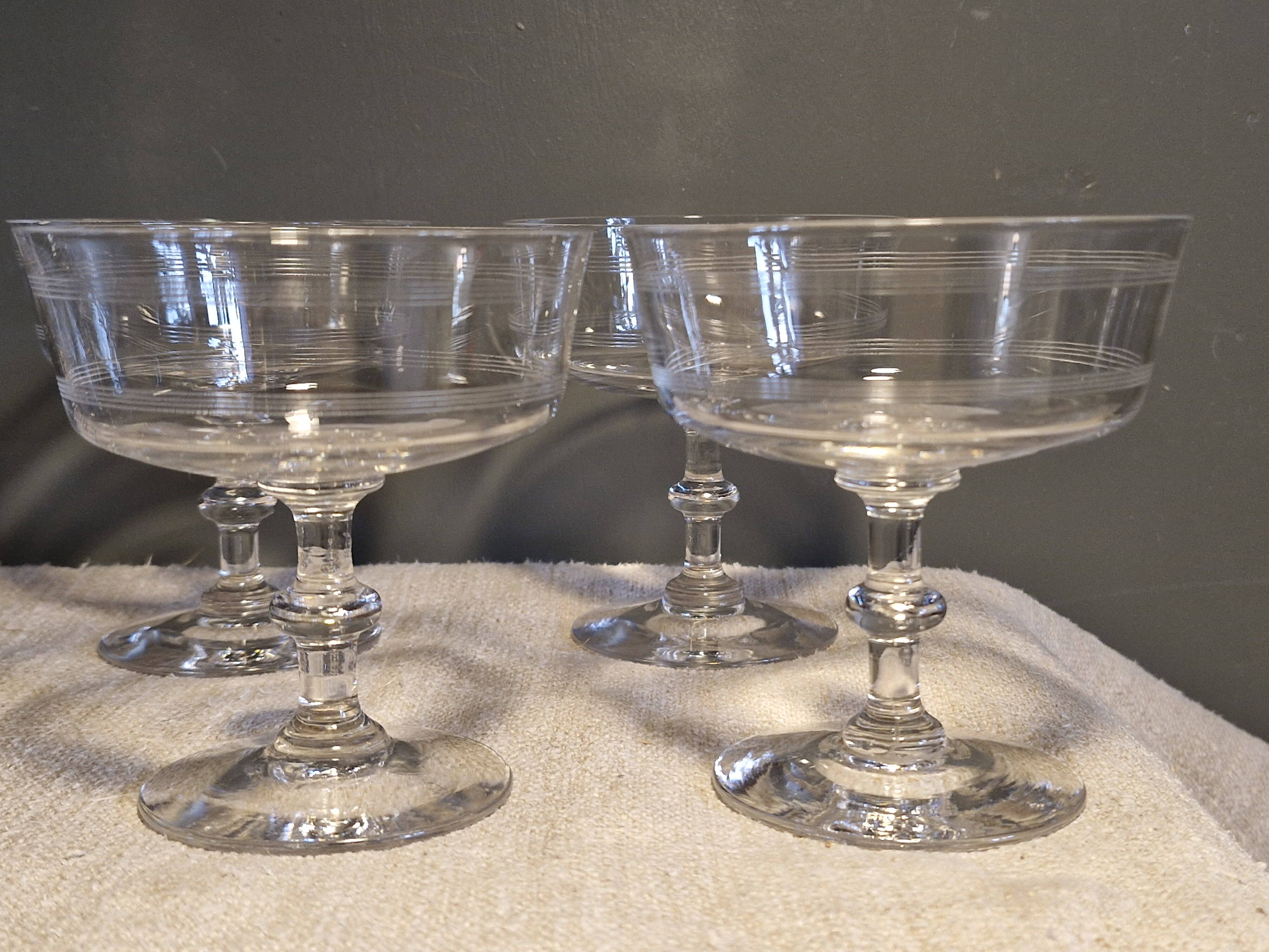 7 crystal champagne coupes from Baccarat - engraved with fillets
