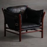 "Lounge chair 'Ilona' by Arne Norell in stained beech and leather, mid-20th century."