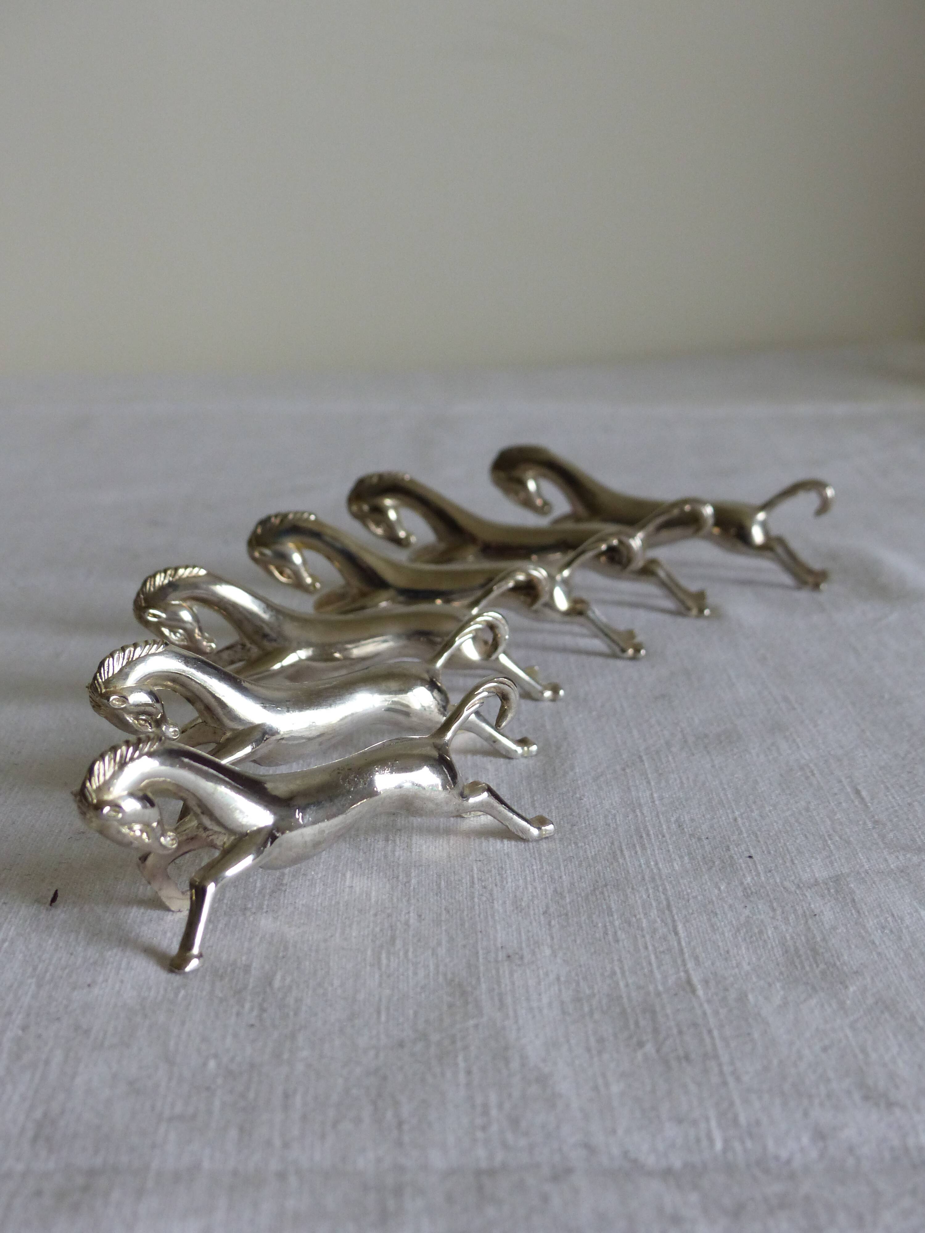 6 metal knife holders, horse.