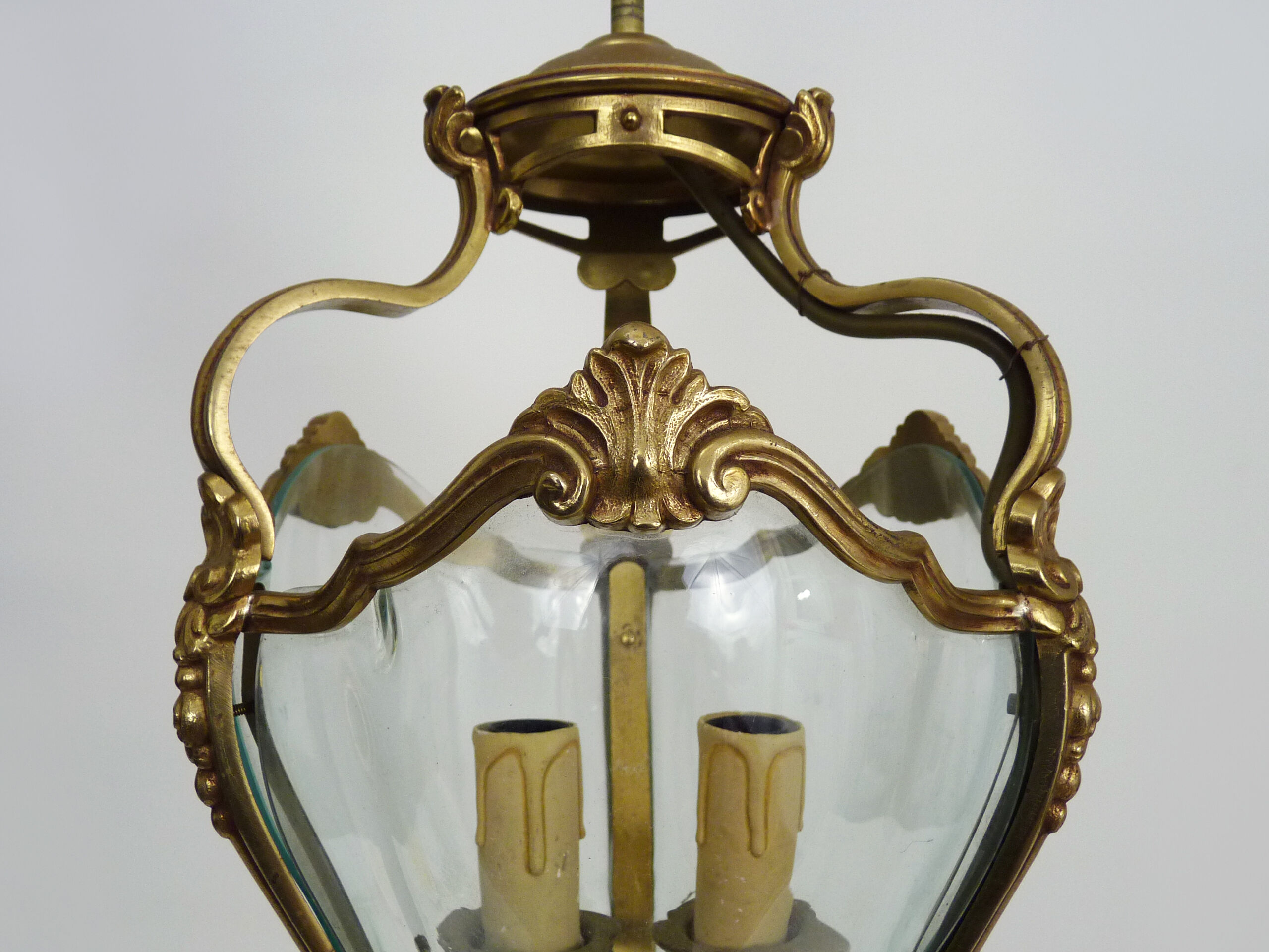 Old lantern with 3 faces, chandelier in gilded bronze and curved glass. Year 60