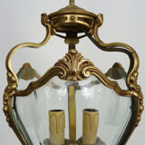 Old lantern with 3 faces, chandelier in gilded bronze and curved glass. Year 60