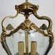Old lantern with 3 faces, chandelier in gilded bronze and curved glass. Year 60