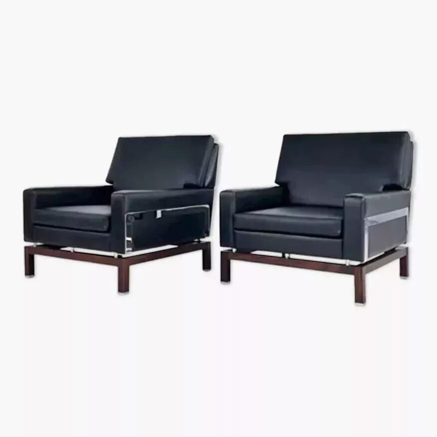 Pair of 50s-60s armchairs in imitation leather, wood and chrome