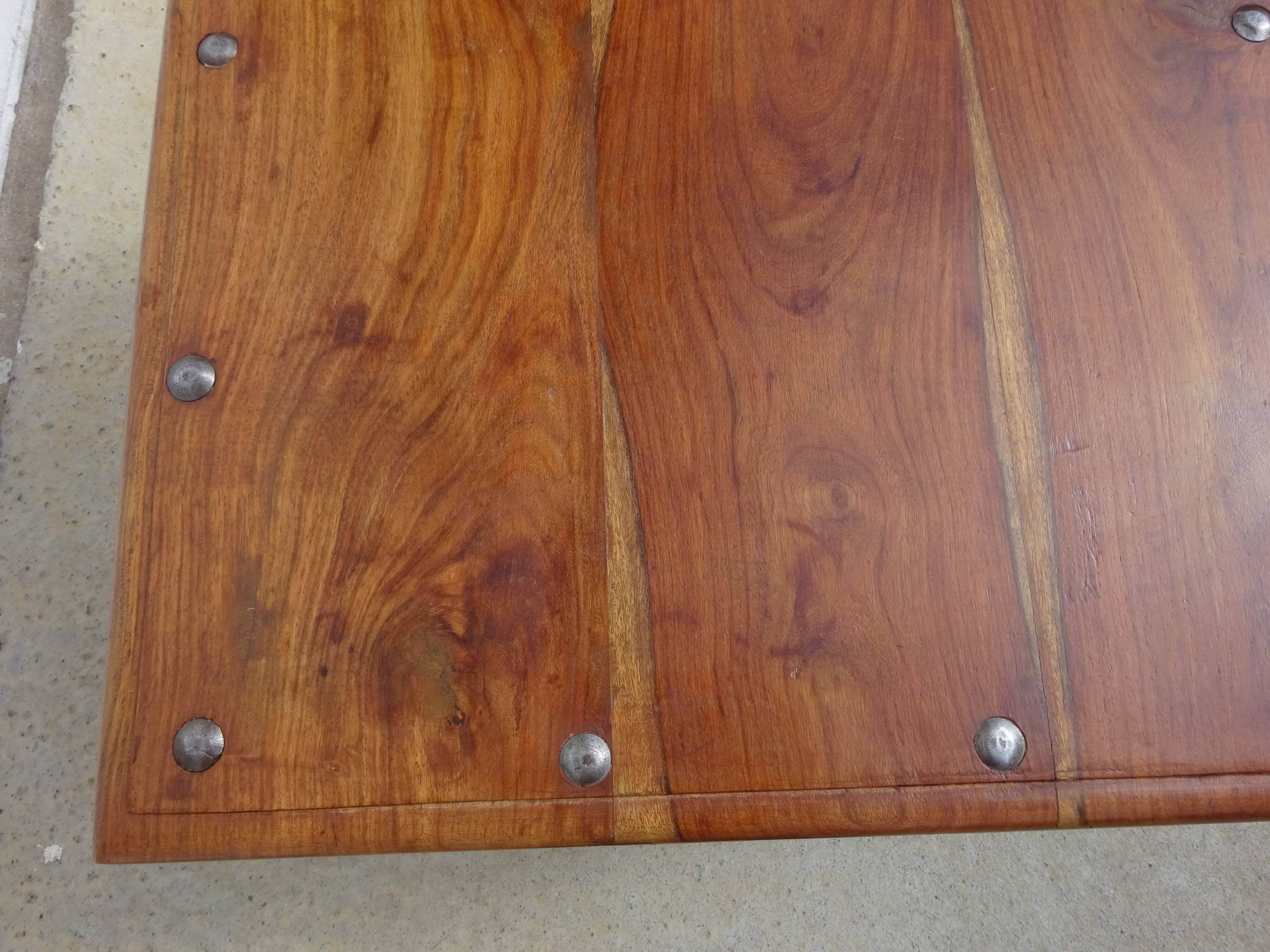 Square coffee table in exotic wood and wrought iron.