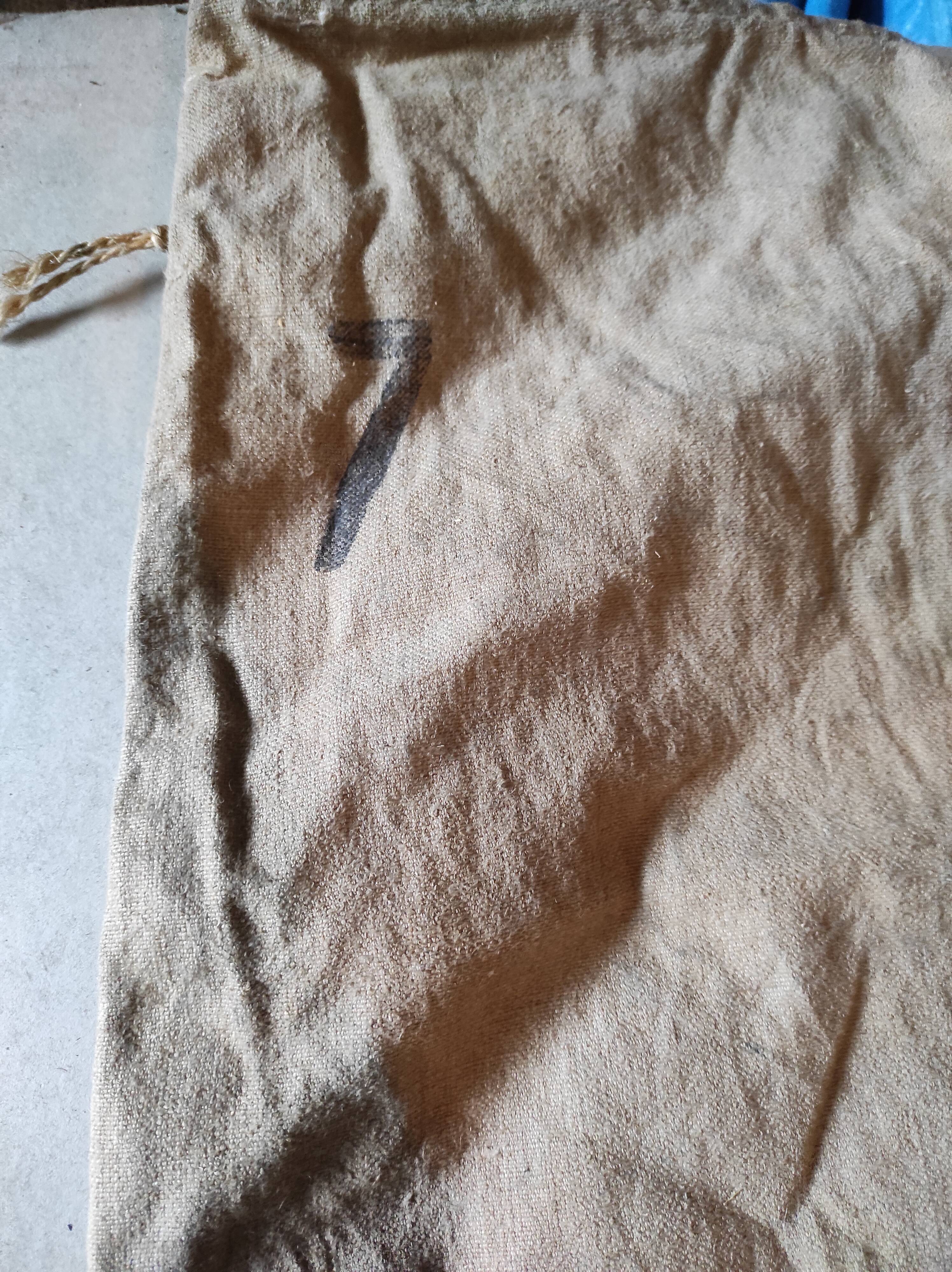 Vintage postal bag trade object of La Poste in mixed-race canvas burlap