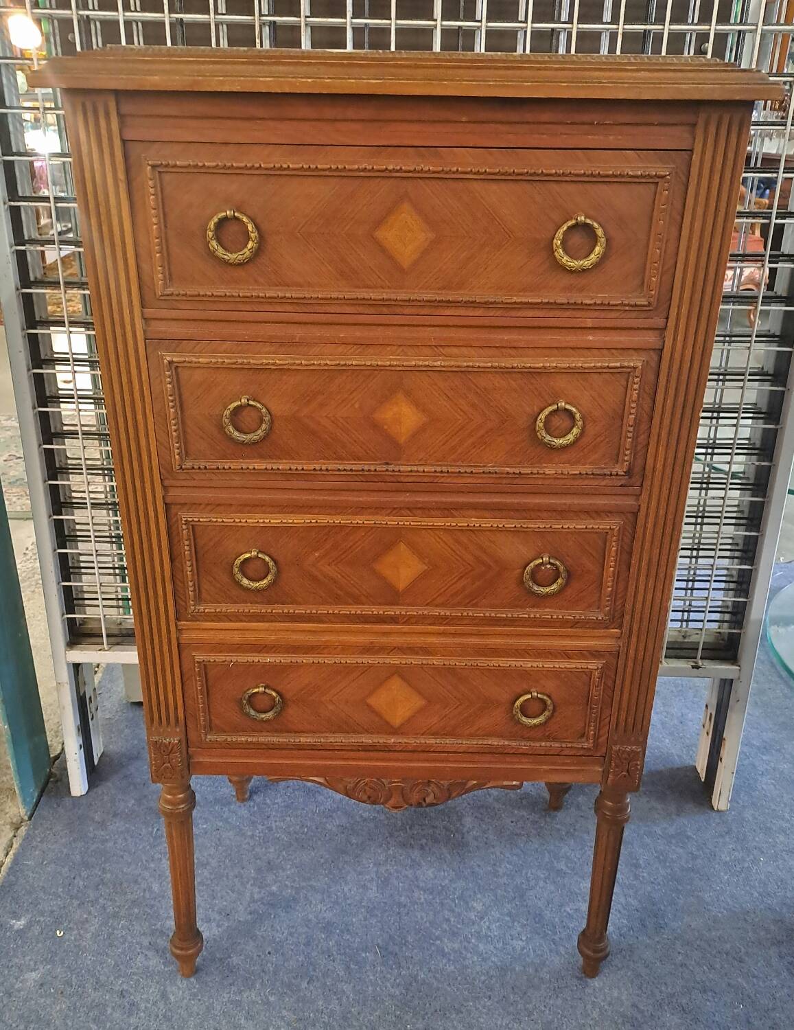 Walnut chest of drawers with 4 pink marble drawers