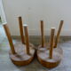 Pair of stools of tripod v with raw wood seat