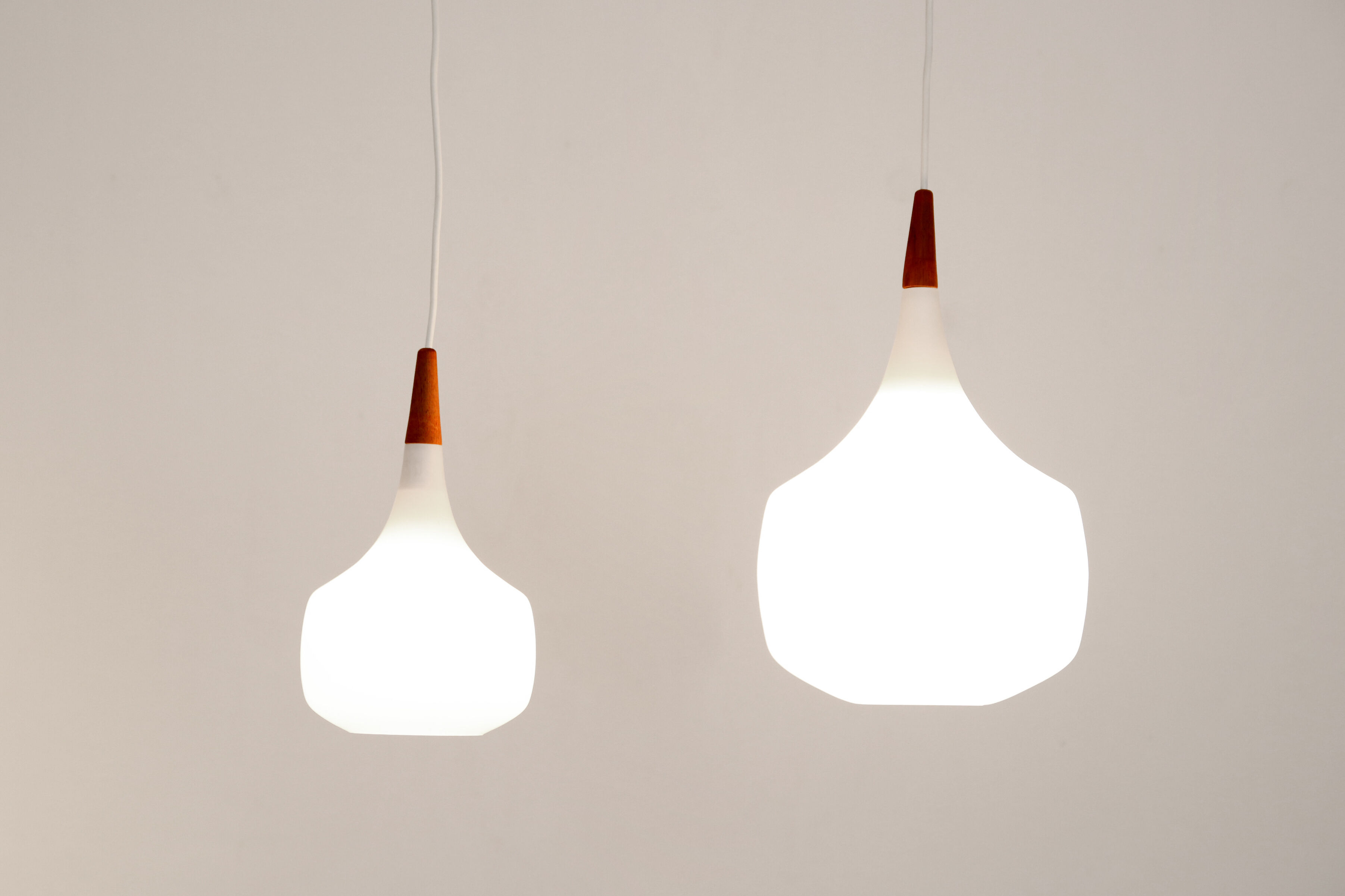 Set of two Holmegaard opaline glass pendant lamps