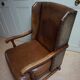 English high back cognac leather wingchair by Criterion cord
