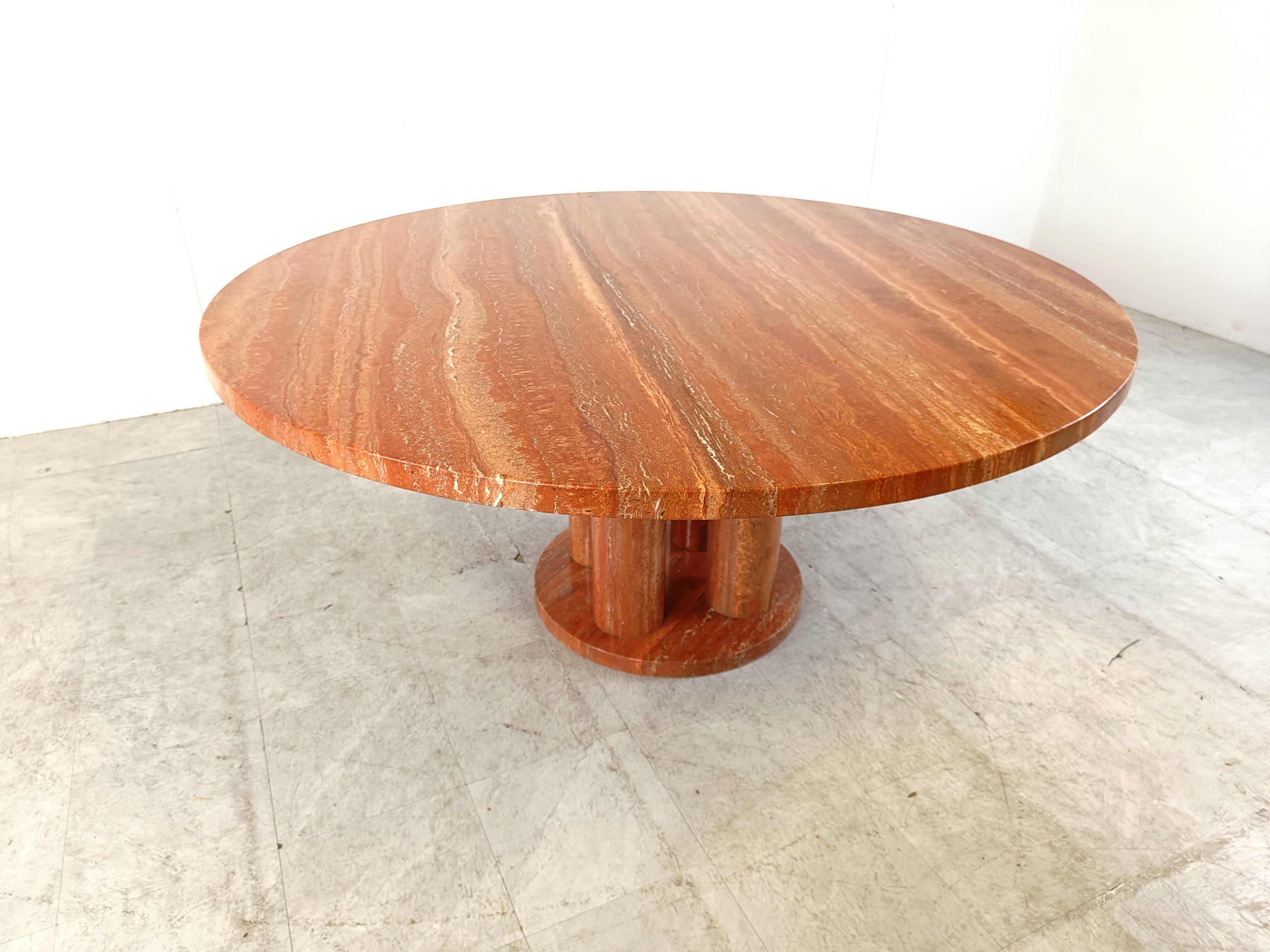 Large round red travertine dining table, 1970s