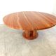 Large round red travertine dining table, 1970s