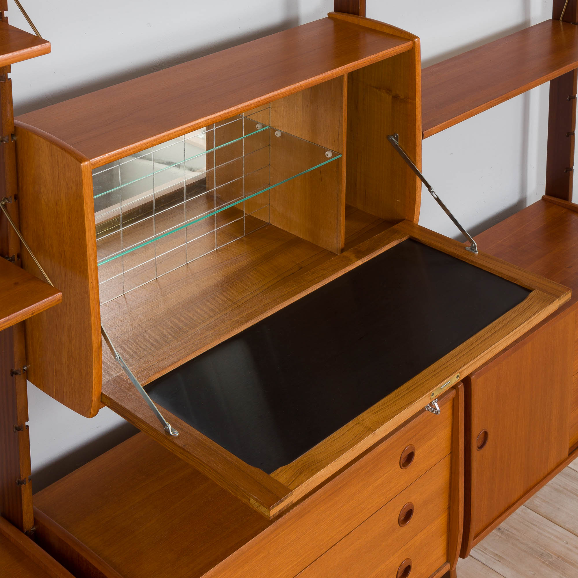 Scandinavian  free standing  Ergo wall unit bar cabinet and 3 cabinets and with 7 shelves,  by John